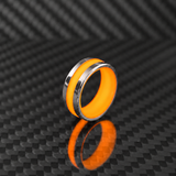 Apollo Lume Silver ring in orange glow, daylight
