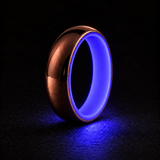 Luminescent Luxe 14K rose gold 5 mm ring with Indigo liner with a powerful glow in deep darkness.