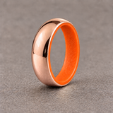Luminescent Luxe 14K rose gold 5 mm ring with Racing Orange liner in daylight.