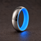 Luminescent Luxe 14K white gold 5 mm ring with Cobalt Blue liner, glowing softly in dim light.