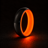 Luminescent Luxe 14K white gold 5 mm ring with Fire Glow liner, glowing powerfully in deep darkness.