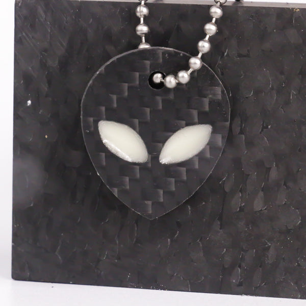 White carbon fiber alien keychain