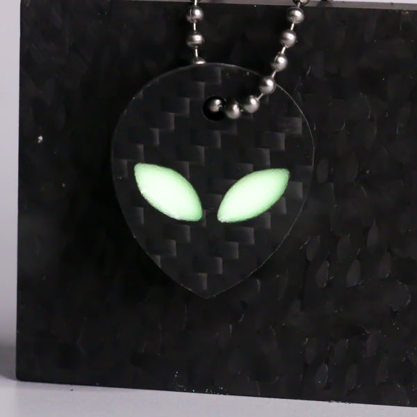White carbon fiber alien keychain
