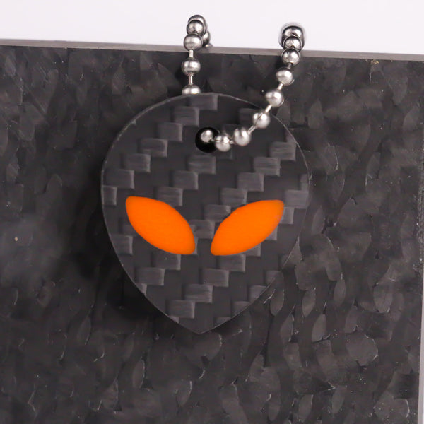 Orange carbon fiber alien keychain