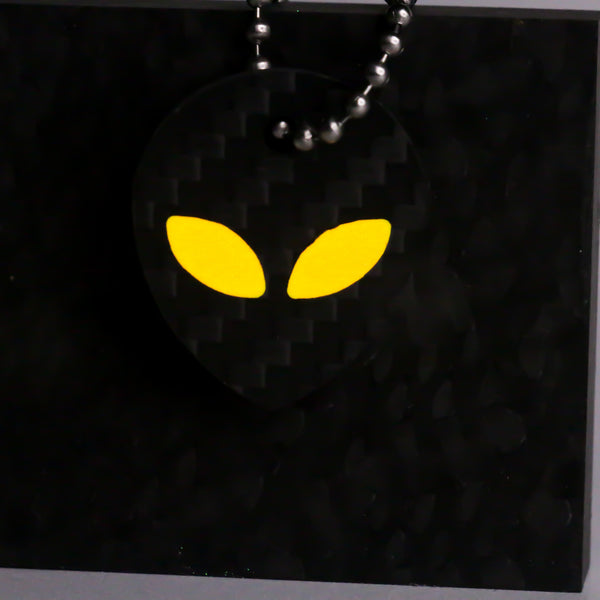 Orange carbon fiber alien keychain