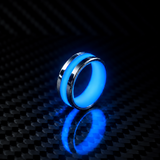 Apollo Lume Silver ring in blue glow, nighttime