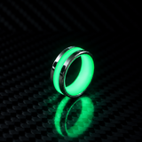 Apollo Lume Silver ring in green glow, nighttime
