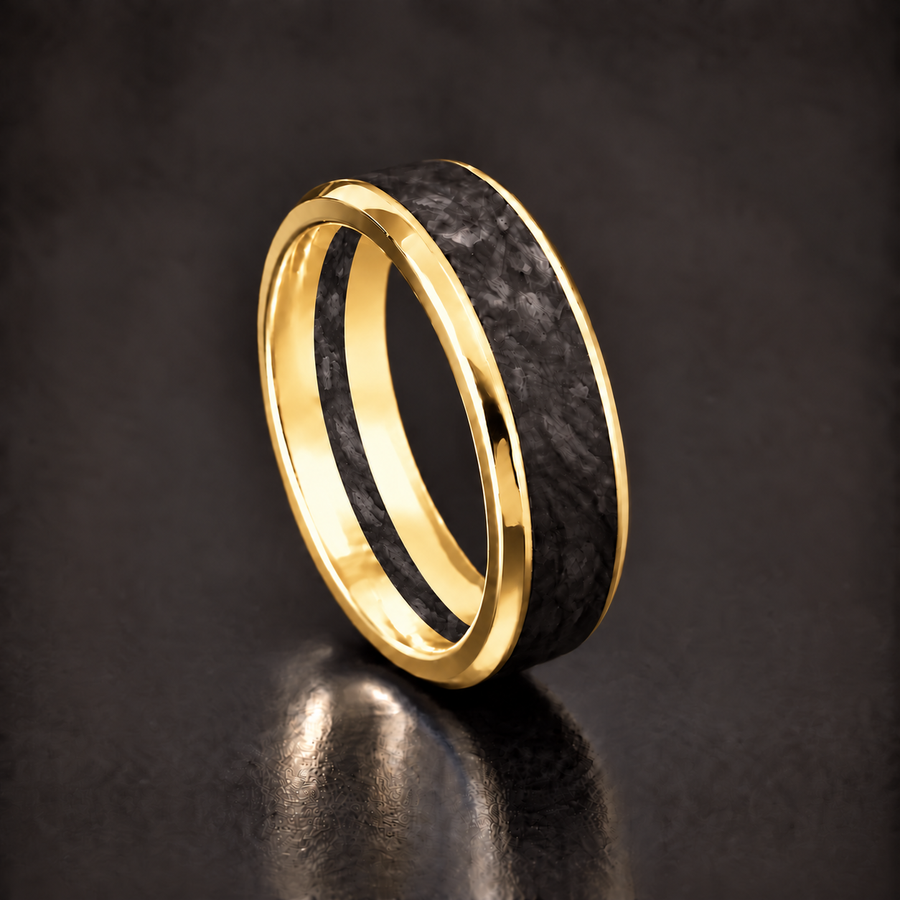 The Sovereign 7mm forged carbon ring in polished 14K yellow gold