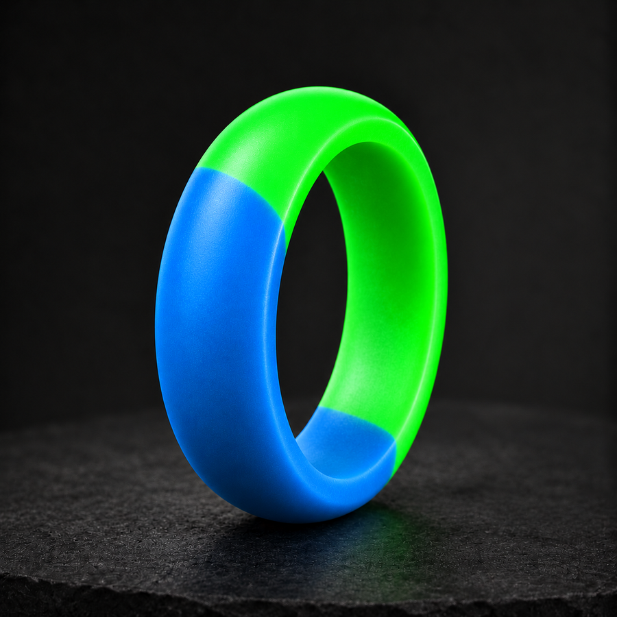 Halo Duality blue and green rounded ring upright on a dark graphite studio backdrop