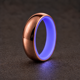 Luminescent Luxe 14K rose gold 5 mm ring with Indigo liner with a soft glow in dim light.
