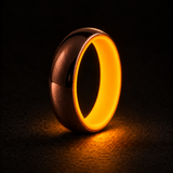 Luminescent Luxe 14K rose gold 5 mm ring with Racing Orange liner with a powerful glow in deep darkness.