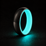 Luminescent Luxe 14K white gold 5 mm ring with Aqua Glow liner, glowing powerfully in deep darkness.