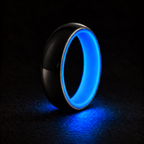 Luminescent Luxe 14K white gold 5 mm ring with Cobalt Blue liner, glowing powerfully in deep darkness.