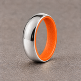Luminescent Luxe 14K white gold 5 mm ring with Racing Orange liner, in daylight.