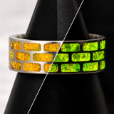 Yellow Brick Road titanium ring with citrine opal shown in daylight and glowing after dark