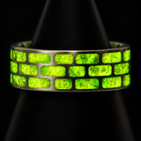 Yellow Brick Road titanium ring glowing vivid yellow green in darkness
