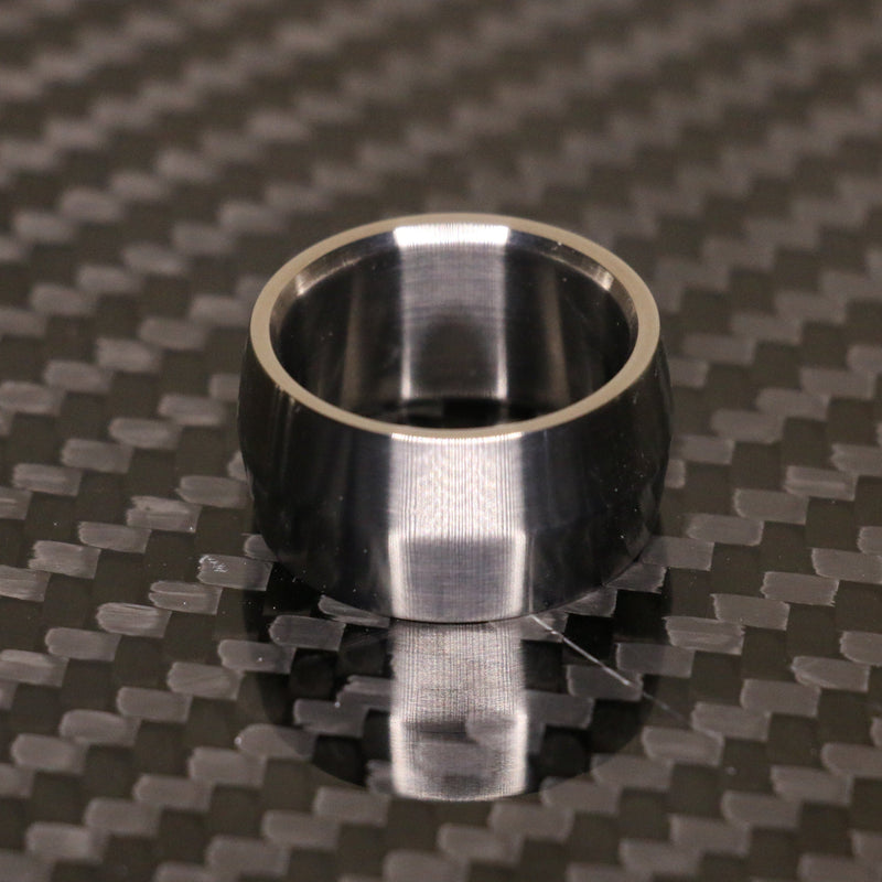 Edge profile broad titanium ring by carbon fi