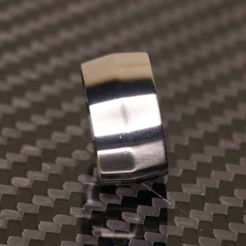 Edge profile broad titanium ring by carbon fi