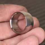 Edge profile broad titanium ring by carbon fi