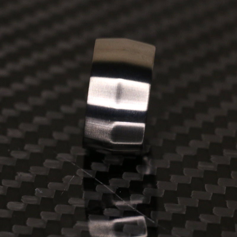 Edge profile broad titanium ring by carbon fi