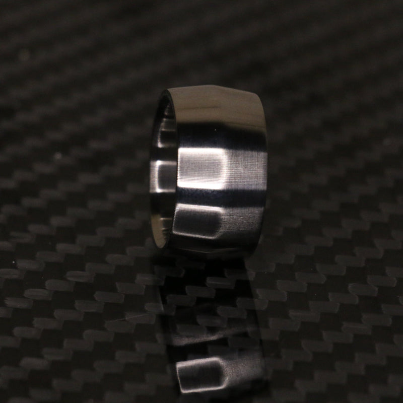 Edge profile broad titanium ring by carbon fi